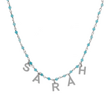 Collana rosario con pietre colorate e letterine pendenti