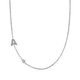 Collanina fine con castoncino e iniziale in zirconi