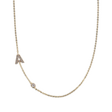 Collanina fine con castoncino e iniziale in zirconi