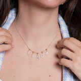 Necklace with name in zirconia and balls