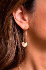 Hoop earrings with heart pendant
