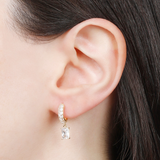 Earrings with a princess cut rectangle pendant