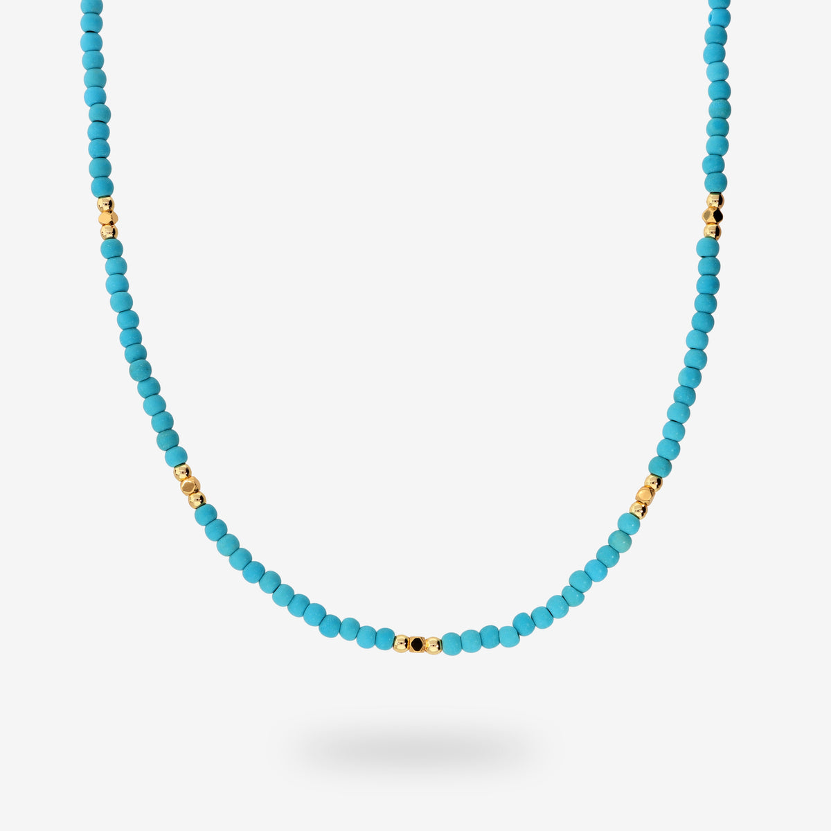 Collana con Pietrine Azzurro Turchese e dettagli dorati - L DI LINDA