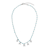 Rosary necklace with colored stones and hanging letters