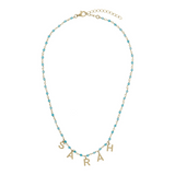 Rosary necklace with colored stones and hanging letters