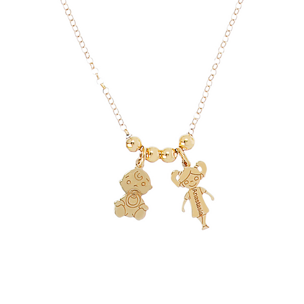 Necklace with two doll pendants and engravings