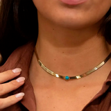Snake necklace with colored center