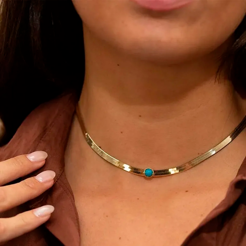 Snake necklace with colored center