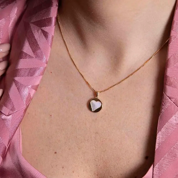 Collana con pendente cerchio e  cuore interno