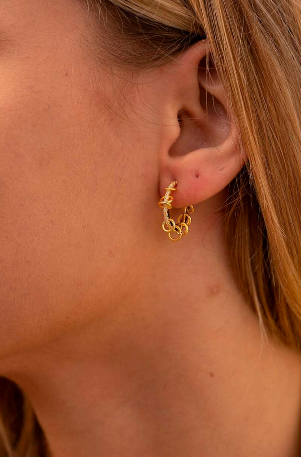 Hoop earrings with zirconia and dangling rings